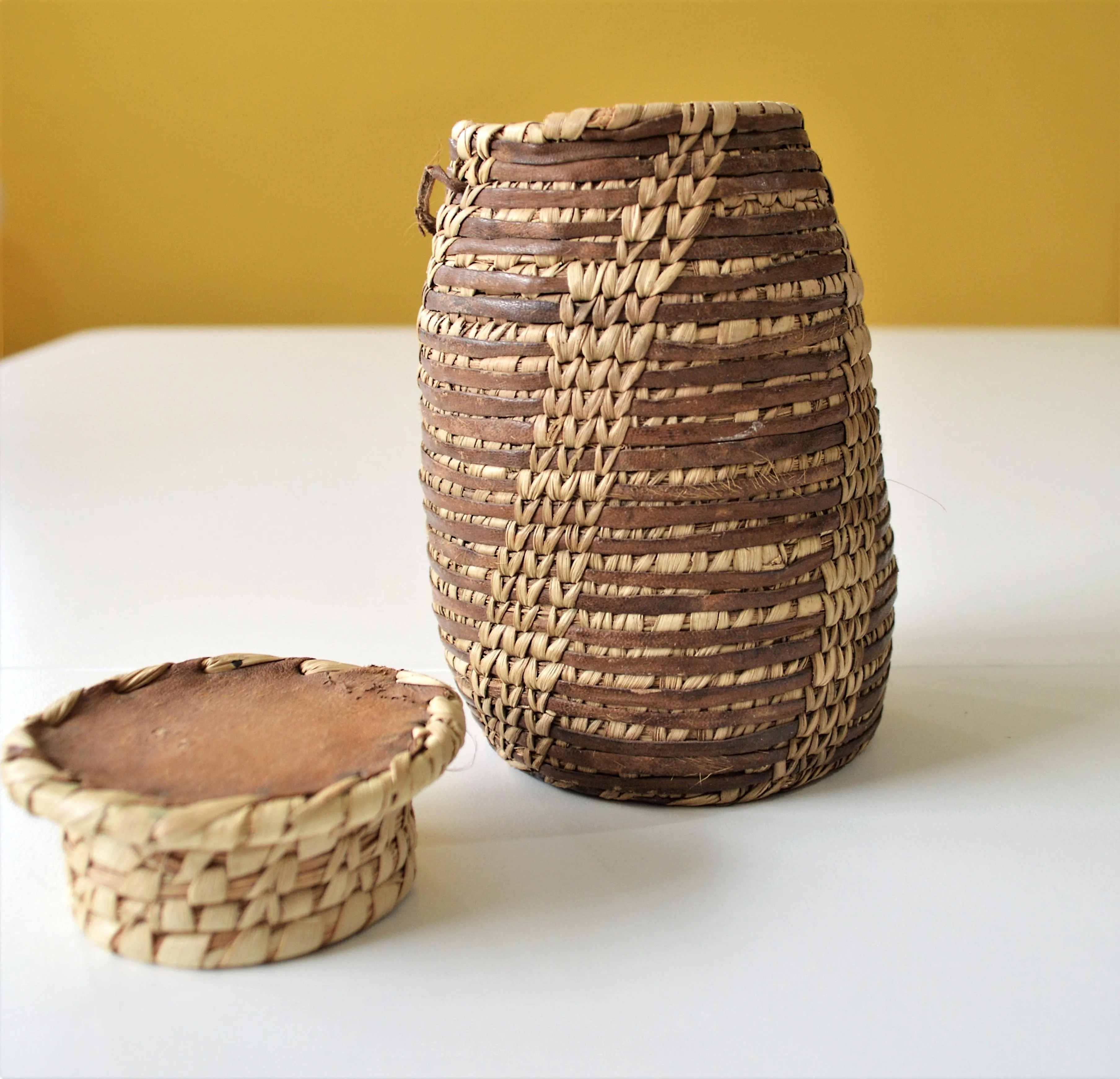 Leather & palm leaves tribal jewelry basket